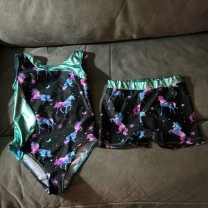 Gymnastics leotard and shorts. Fits 4/5 year old. Very good condition.
